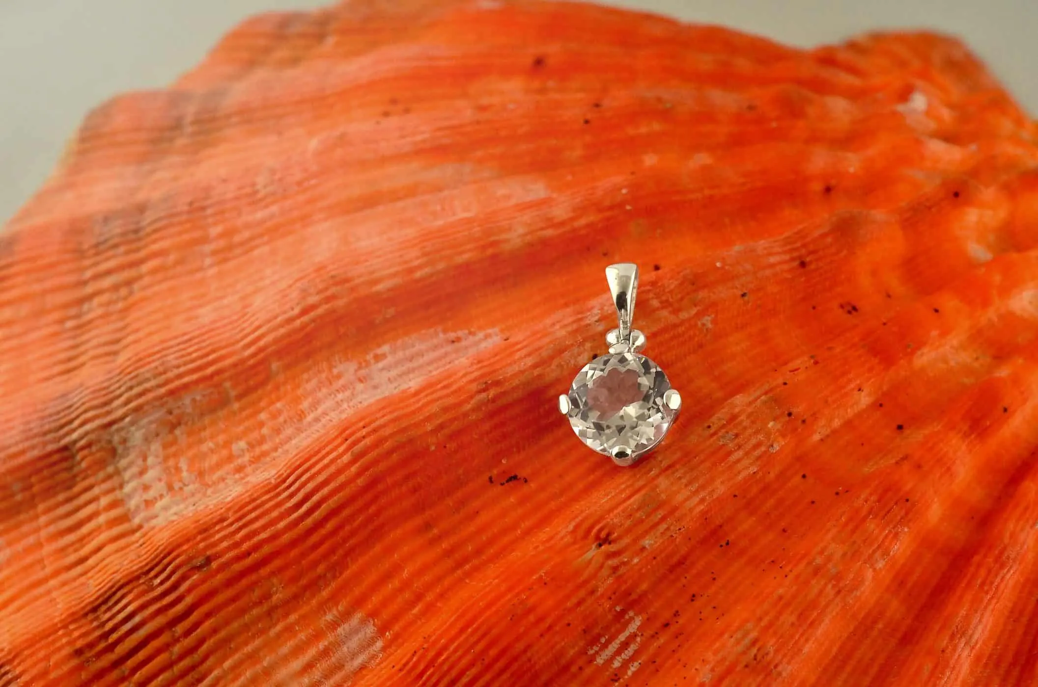 Starborn Danburite Round Faceted Pendant in Sterling Silver