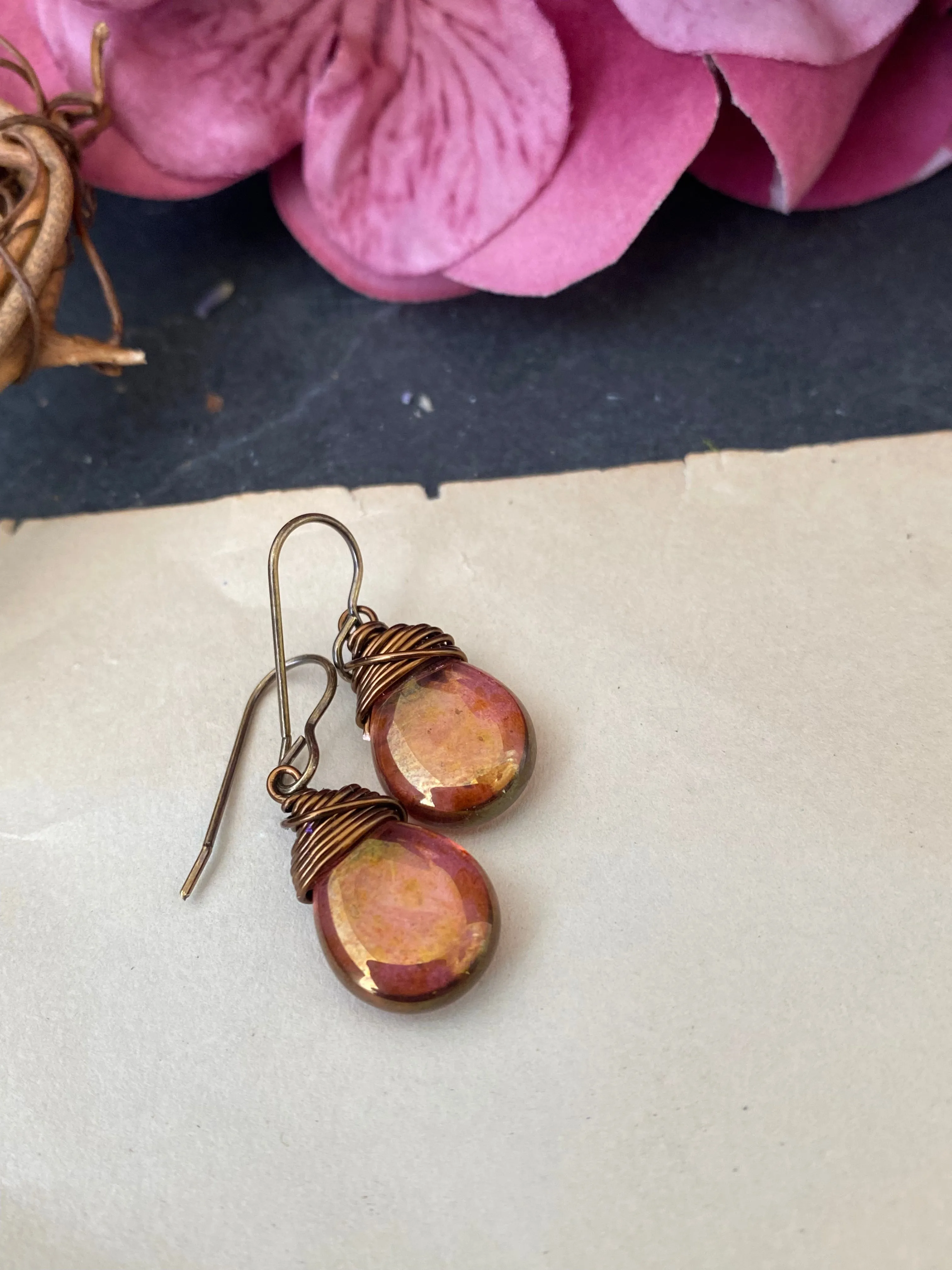 Teardrop glass in pink and gold hues and bronze wire wrapped earrings.